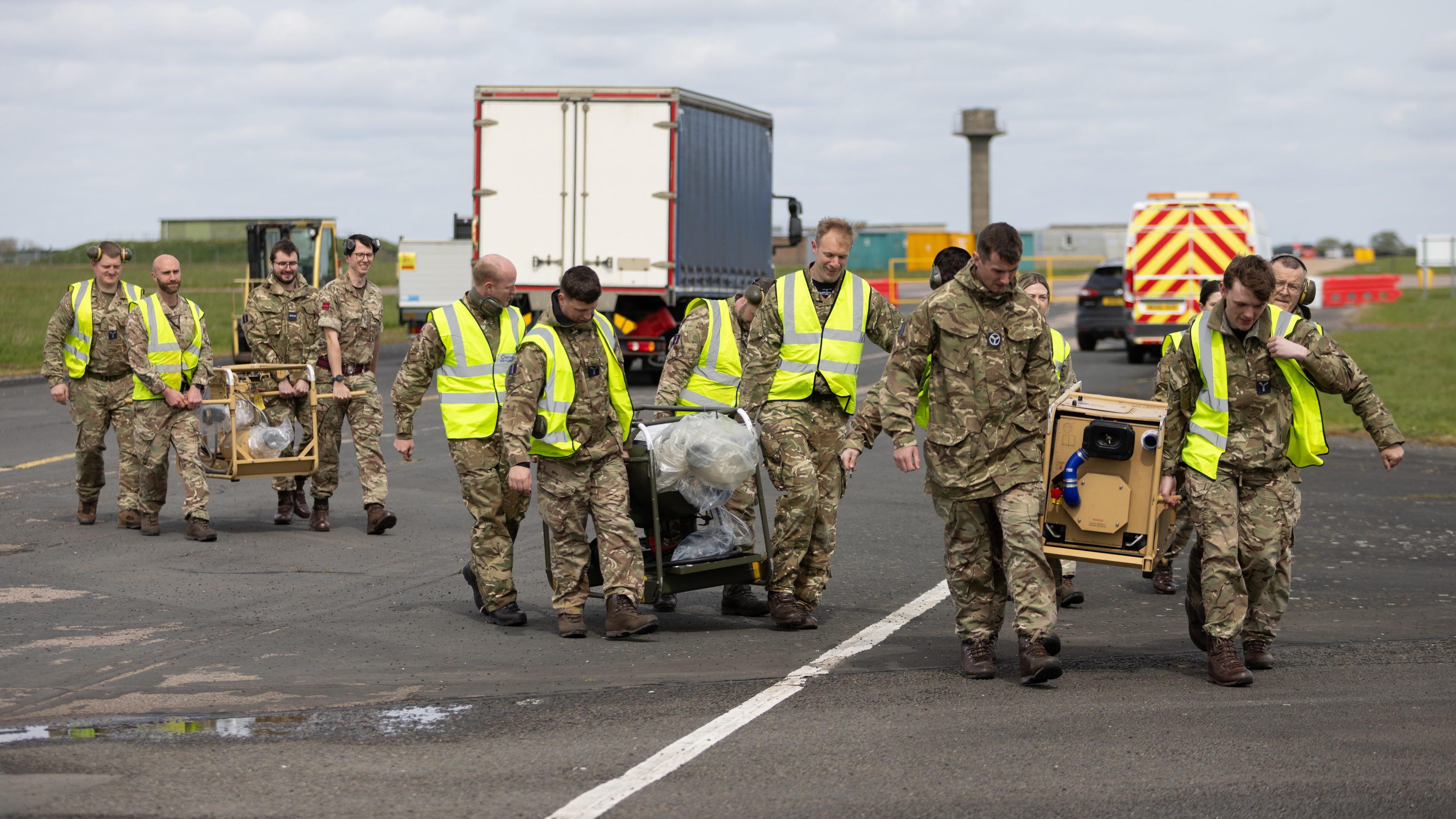 Fuels Support Team from RAF Wittering loading a Mobile Fueling Point onto an Atlas C Mk.1 aircraft.